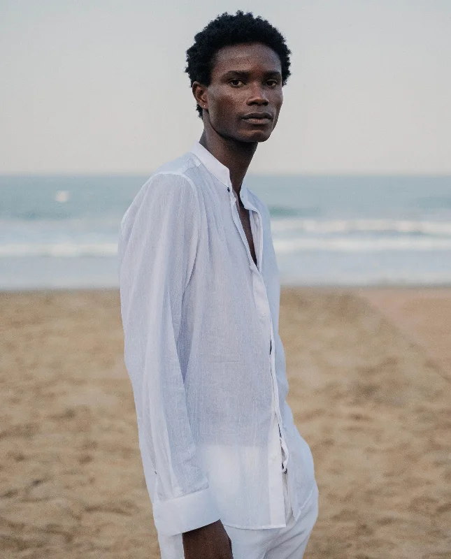 Men's Solid-Colored Shirts for VersatilityRare Rabbit Men's Crinkle LS White Cotton Fabric Mandarin Collar Full Sleeves Solid Crinkle Effect Shirt Men's Solid-Colored Shirts for VersatilityRare Rabbit Men's Crinkle LS White Cotton Fabric Mandarin Collar Full Sleeves Solid Crinkle Effect Shirt